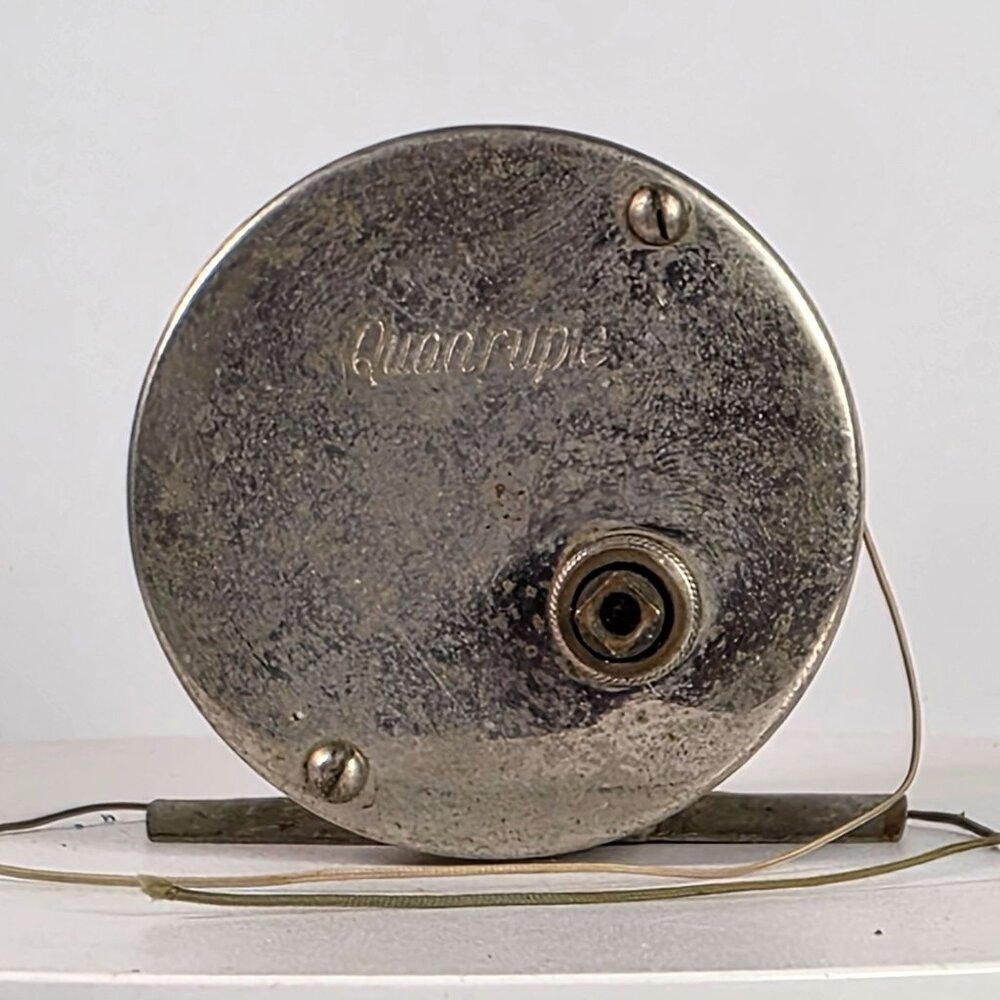 Vintage Quadruple Fishing Reel Silver-Tone Metal & Multi-Color Line 2.5" Diamete